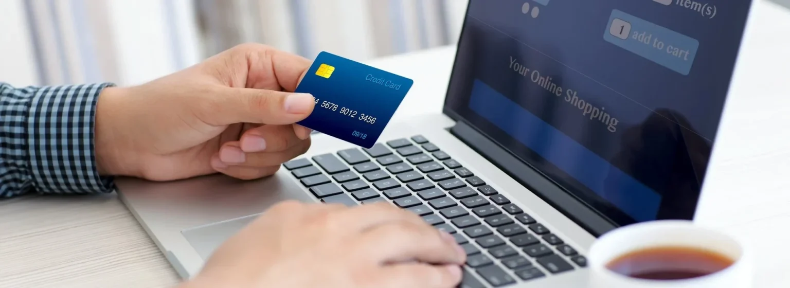 An online shopper inputting his credit card details.