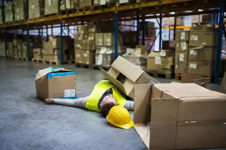 A warehouse worker in a warehouse accident.