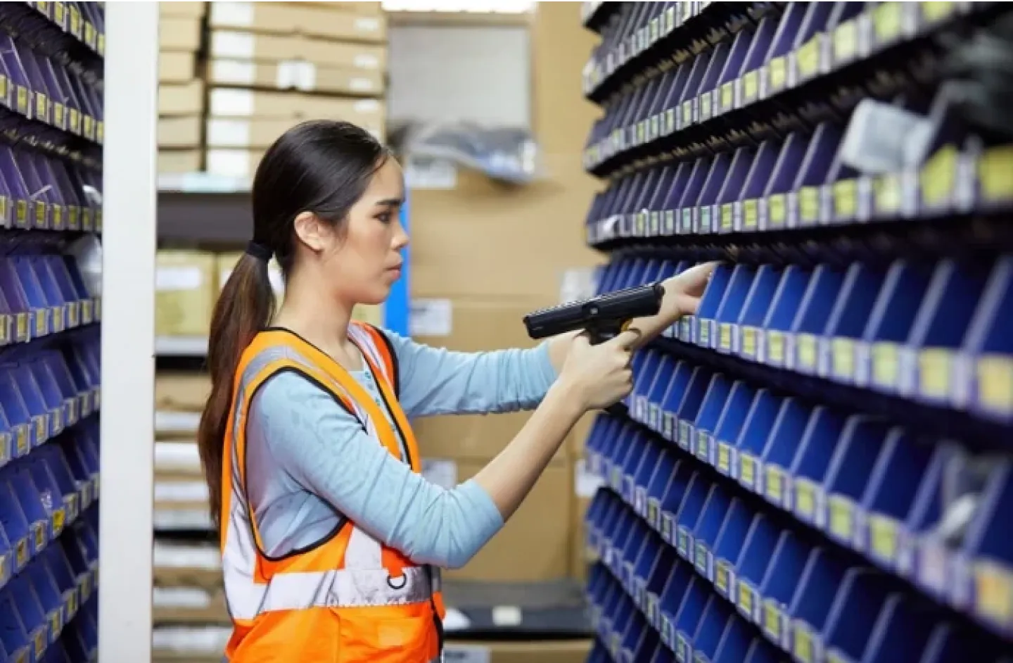 A warehouse worker in a fulfillment center.