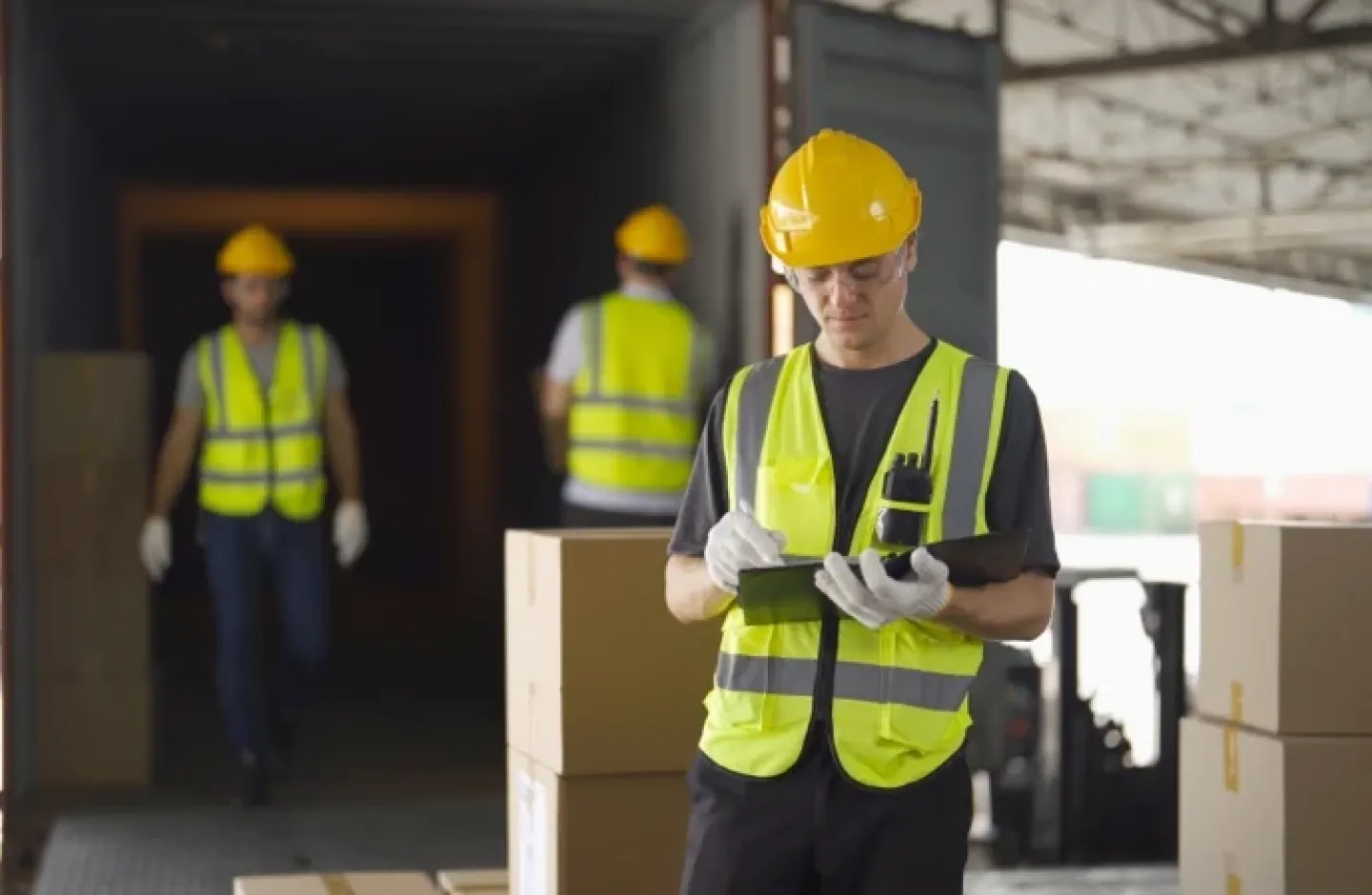 Receiving and shipping clerk performing his warehouse role.